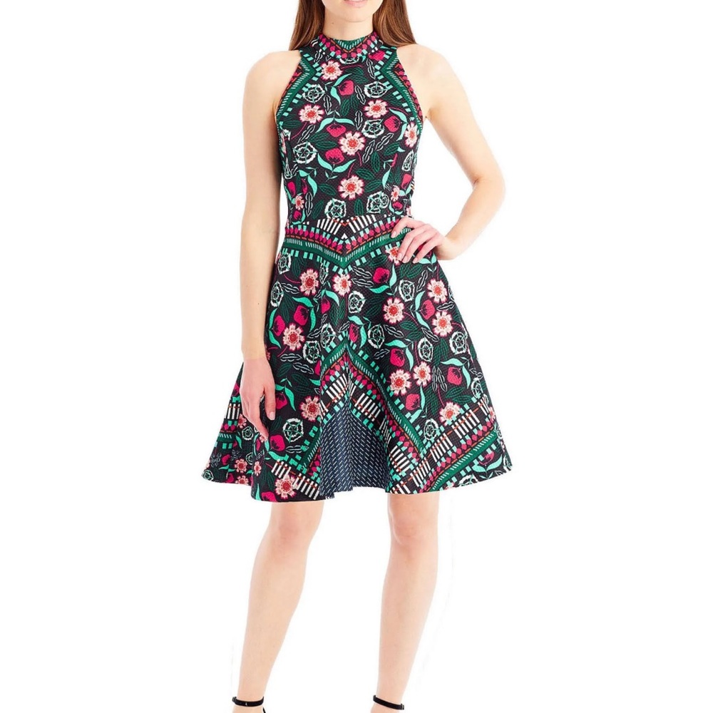 Nicole miller New York haltered, sleeveless,floral, high neck, medium length.